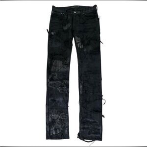 Jun Takahashi’s Undercover 85s Black Distressed Denim
